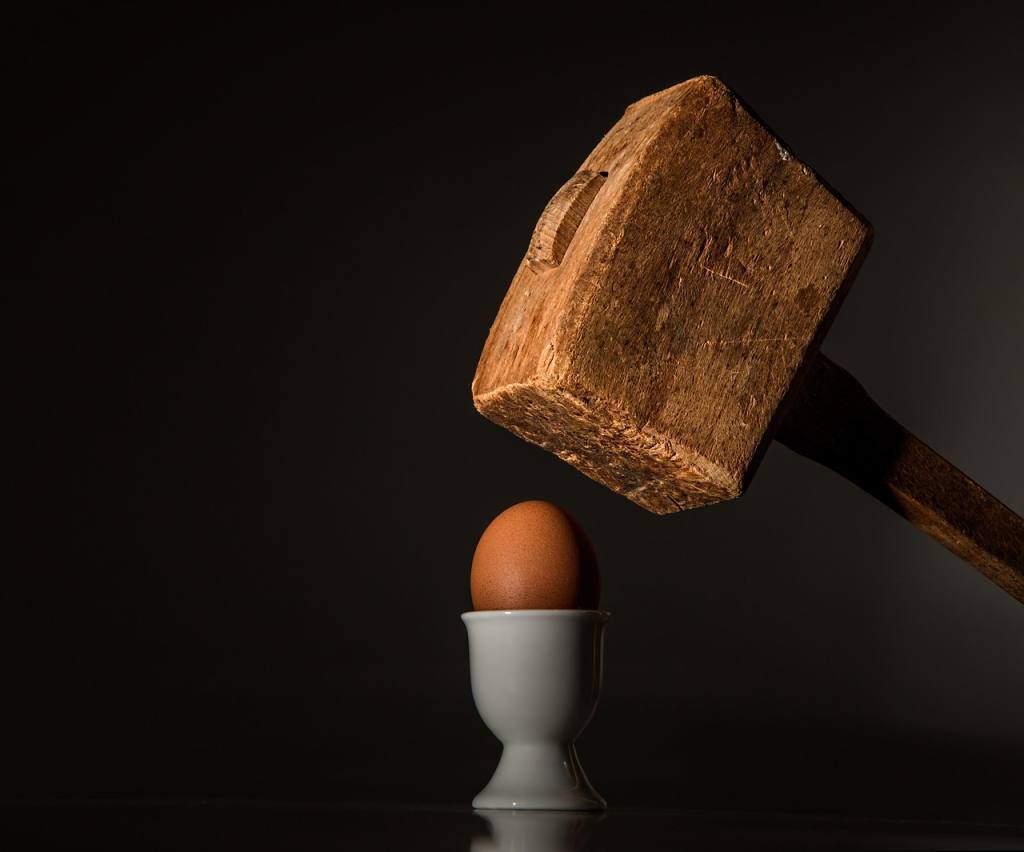 egg, hammer, hit, beat, fragile, vulnerable, threaten, fear, intimidate, force, scare, frighten, coerce, aggression, power, attack, conflict, brutal, coercion, cruel, pounding, anger, smash, blow, shatter, hostile